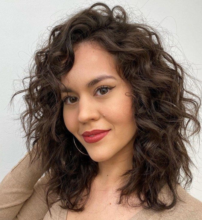 Medium Length Curly Layered Hairstyle