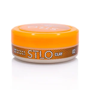 Styling hair using STLO Clay for a natural matte finish